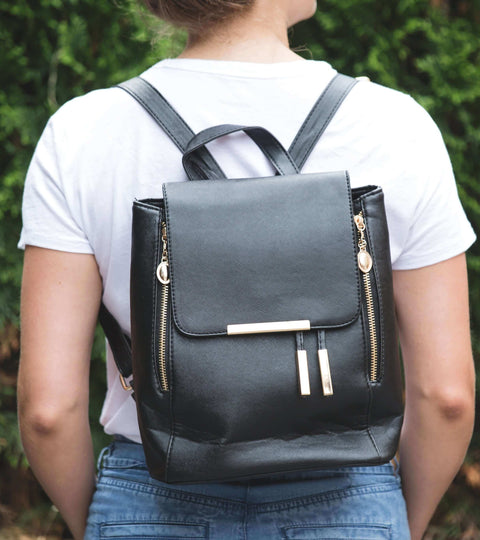 male model wearing sustainable backpack