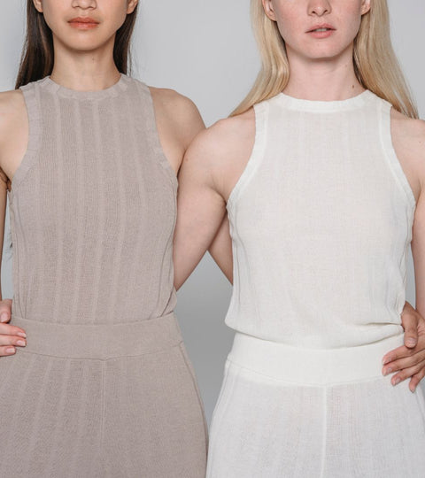 Portrait of a model in minimalist PANGAIA-style clothing — representing science-led sustainable fashion.