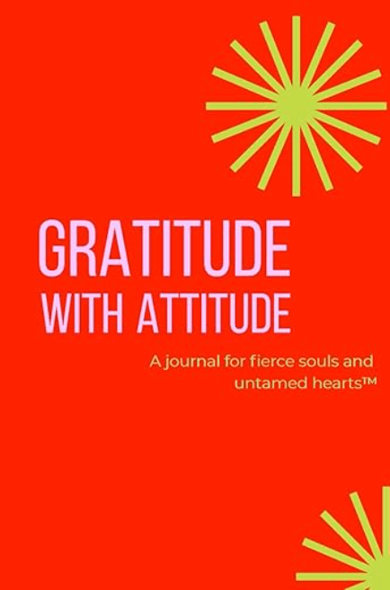 Scarlet Destiny's gratitude journal features a vivid red cover with green starbursts. GRATITUDE WITH ATTITUDE stands out in bold, with "A journal for fierce souls and untamed hearts™" below—ideal for setting intentions.