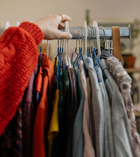 garment rail full of second hand clothes