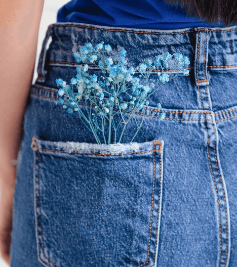5 Sustainable UK Brands Doing an Amazing Job featuring denim flowers from a sustainable UK fashion brand