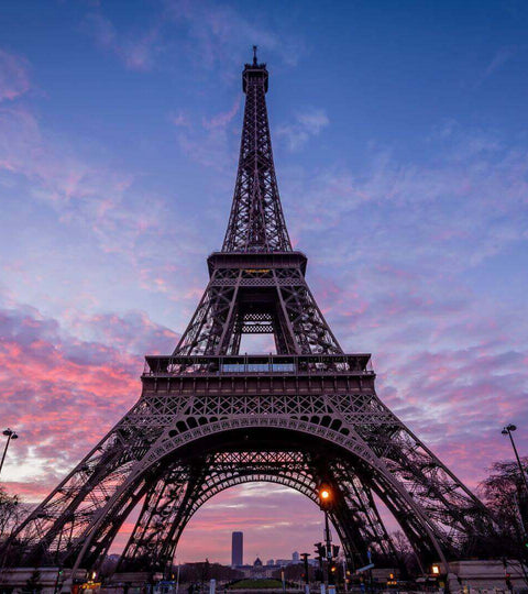 Eiffel Tower at sunset representing Paris 2024 Olympics fashion moments