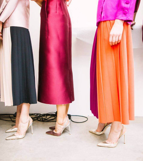 Fashion resale market trends highlighted by colorful skirts and stylish heels on display.