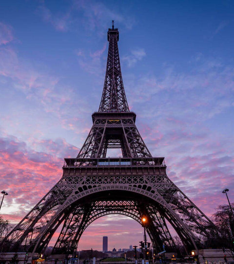 Eiffel Tower at sunset representing Paris 2024 Olympics fashion moments