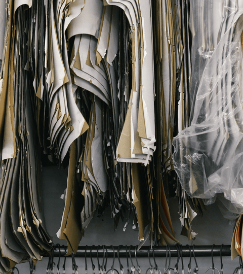 Collection of leather patterns and cut pieces showcasing the intricacies of leather crafting.