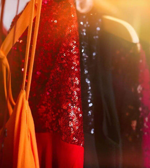 Red and orange garments decorated with eco-friendly sequins
