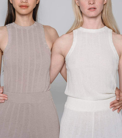 Portrait of a model in minimalist PANGAIA-style clothing — representing science-led sustainable fashion.