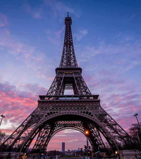 Eiffel Tower at sunset representing Paris 2024 Olympics fashion moments
