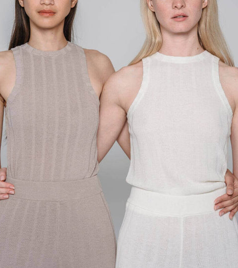 Portrait of a model in minimalist PANGAIA-style clothing — representing science-led sustainable fashion.