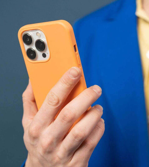 image of person holding smart phone, symbolising AI collaboration in a modern workplace.