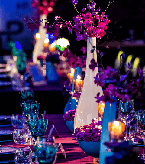 Elegant table setting with vibrant flowers, highlighting the Met Gala decor.