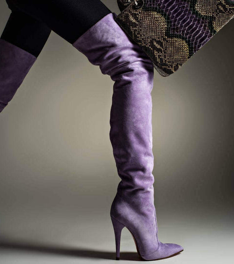 Stella McCartney over-the-knee purple boots and snake print bag styled for sustainability spotlight