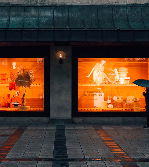 Storefront with sustainable fashion display highlighting eco-conscious brick-and-mortar retail