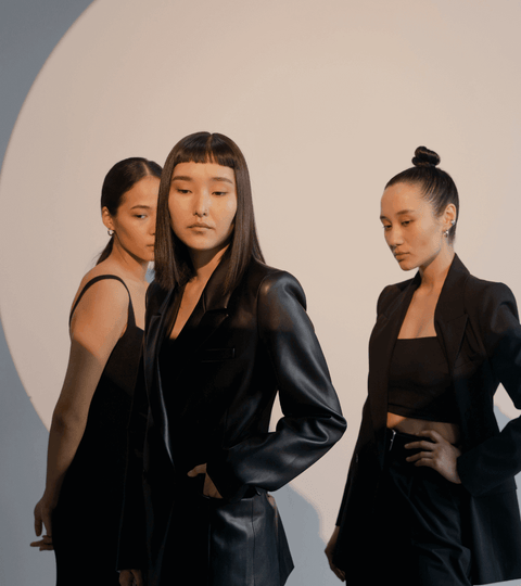 Spotlight On Creativvo Sustainable Fashion Platform featuring models in stylish black outfits.