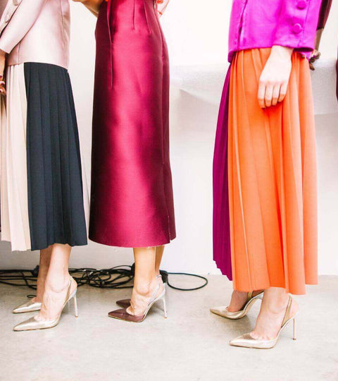 Fashion resale market trends highlighted by colorful skirts and stylish heels on display.