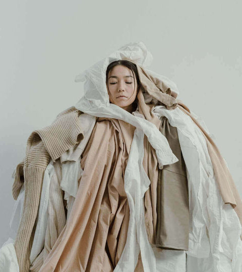 Assorted garments representing tech in circular fashion economy